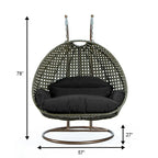 LeisureMod 2 Person Hanging Egg Chair with Stand - Outdoor/Indoor Rattan Wicker Patio Swing Hammock Lounger with Cushions