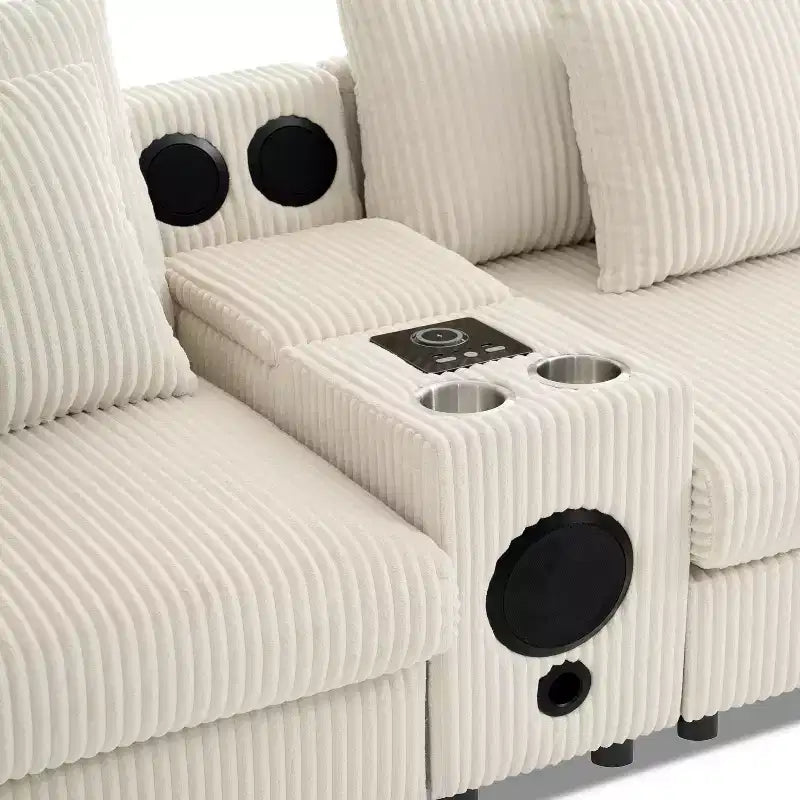 Divano componibile a L in velluto a coste da 114'' con altoparlanti Bluetooth, caricabatterie USB, portabicchieri e pouf - ModernLuxe