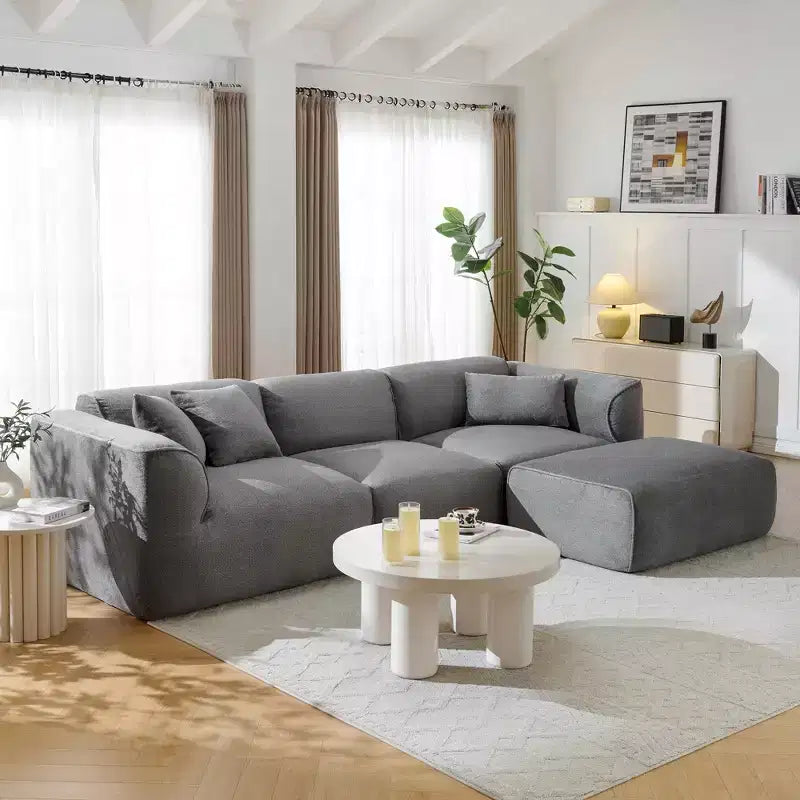 Divano da salotto di lusso a 4 posti in velluto Clihome con pouf mobile, divano imbottito