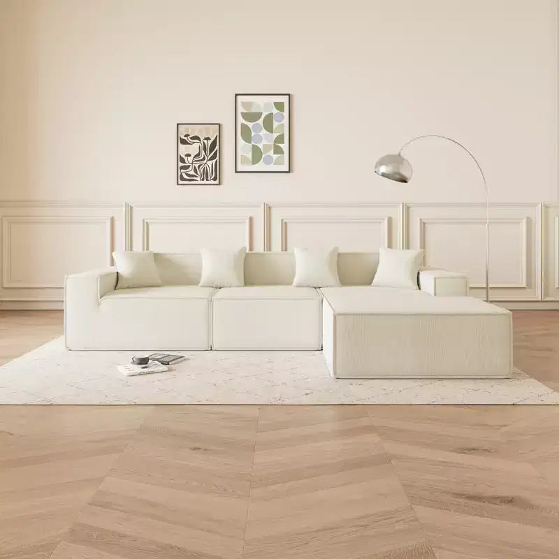 GDFStudio Nira Moderno Divano Sezionale a 3 Posti Reversibile Senza Struttura Rivestito in Velluto a Coste da 109'' con Pouf e 4 Cuscini