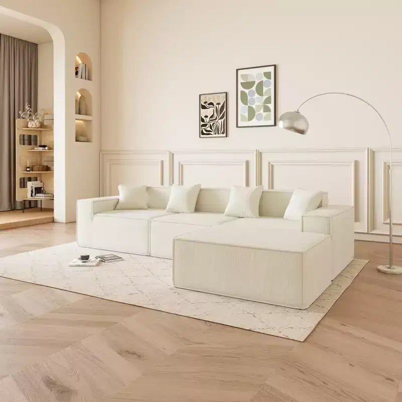 GDFStudio Nira Moderno Divano Sezionale a 3 Posti Reversibile Senza Struttura Rivestito in Velluto a Coste da 109'' con Pouf e 4 Cuscini