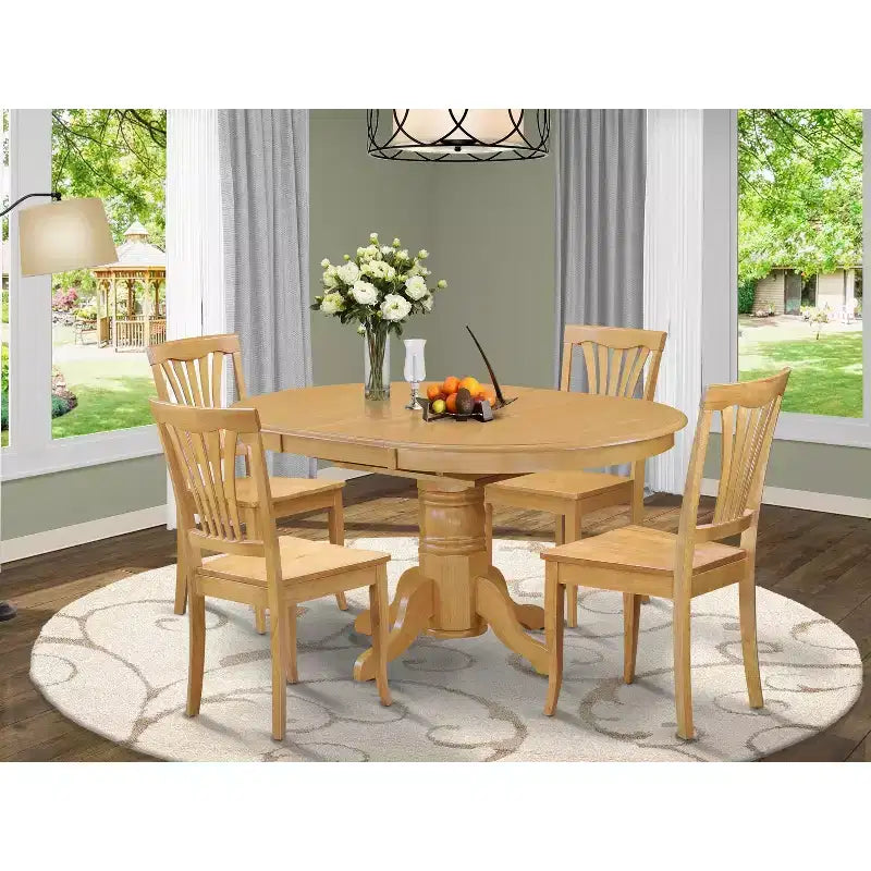 Set pranzo HomeStock da 5 pezzi con tavolo ovale in legno massello finitura rovere naturale e 4 sedie