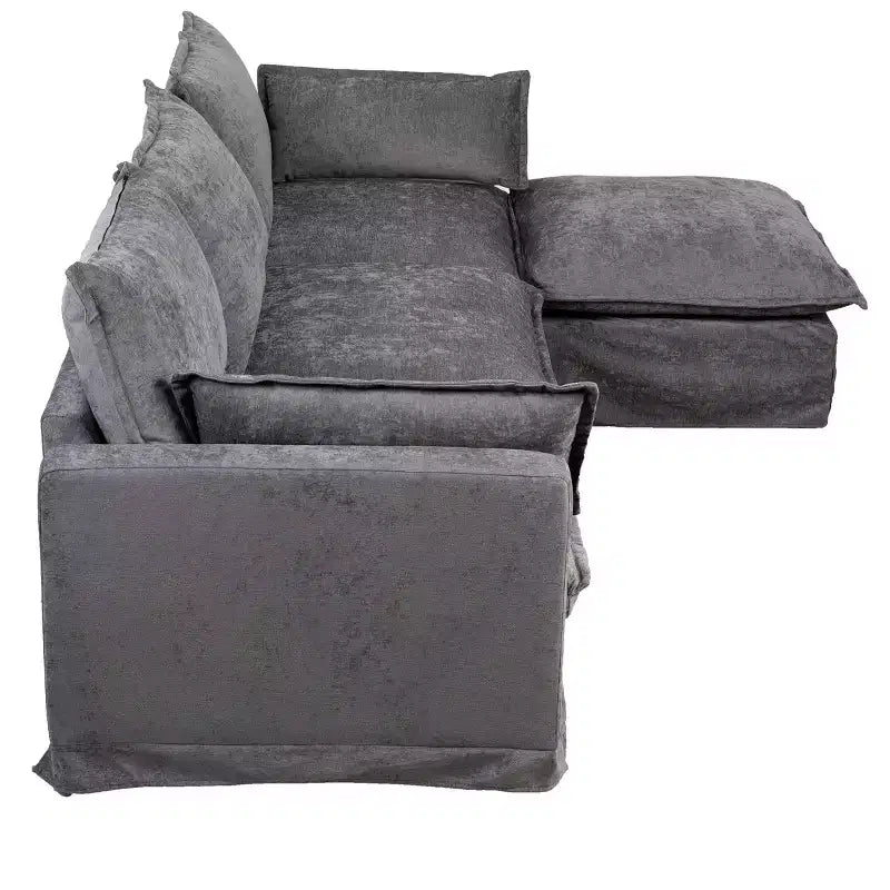 Divano a 4 posti a L moderno GDFStudio Sewell in simil lino con pouf mobile