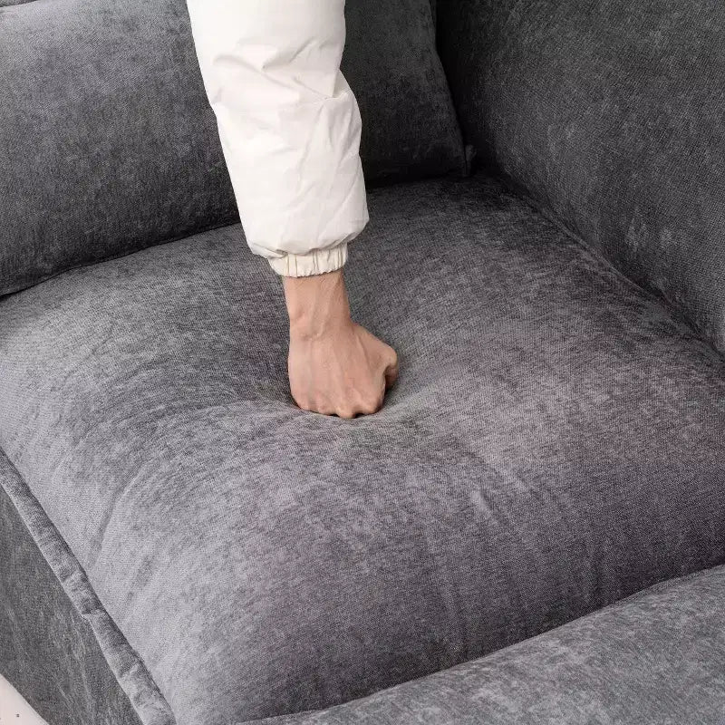 Divano a 4 posti a L moderno GDFStudio Sewell in simil lino con pouf mobile