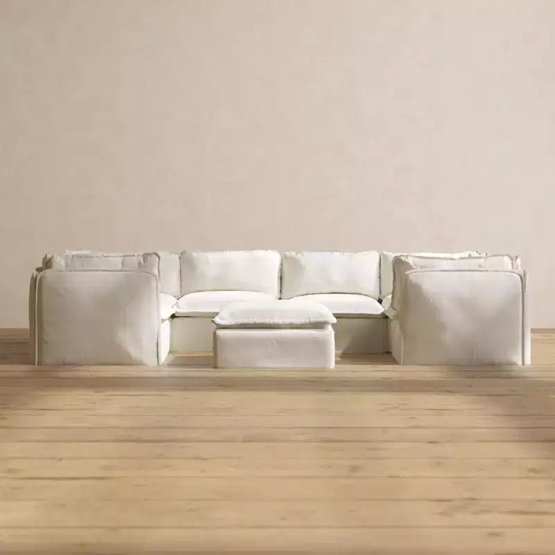 Divano componibile modulare Anabei lavabile a U a 6 posti + pouf | seduta Deluxe+ e cuscino cloud
