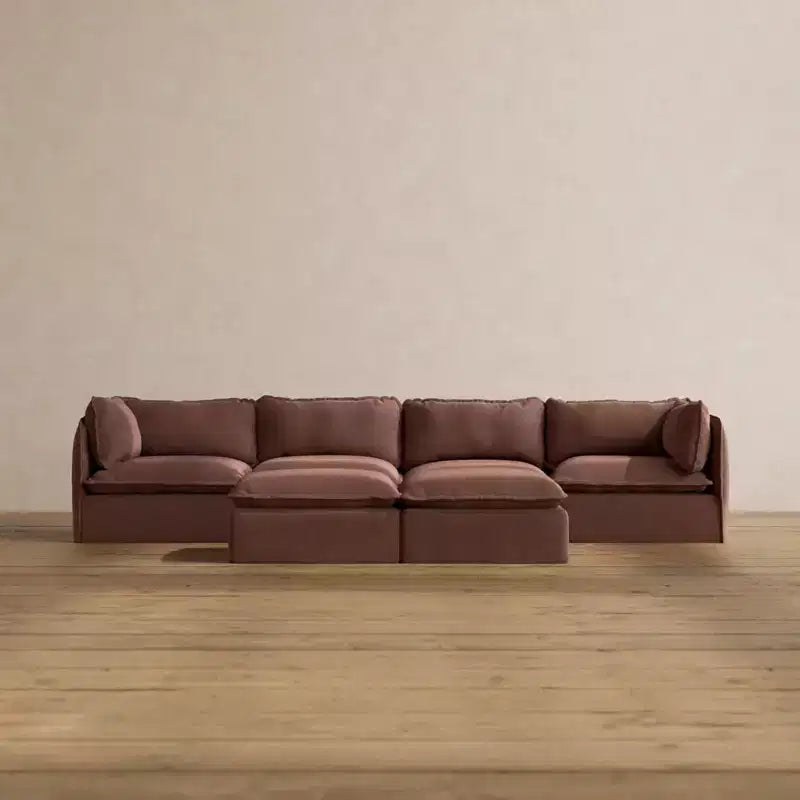 Divano componibile Anabei lavabile, 4 posti + pouf a panca | seduta Deluxe+ e cuscino cloud