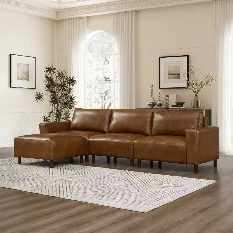 Divano componibile a 3 posti GDFStudio Arvin 112 in finta pelle con pouf