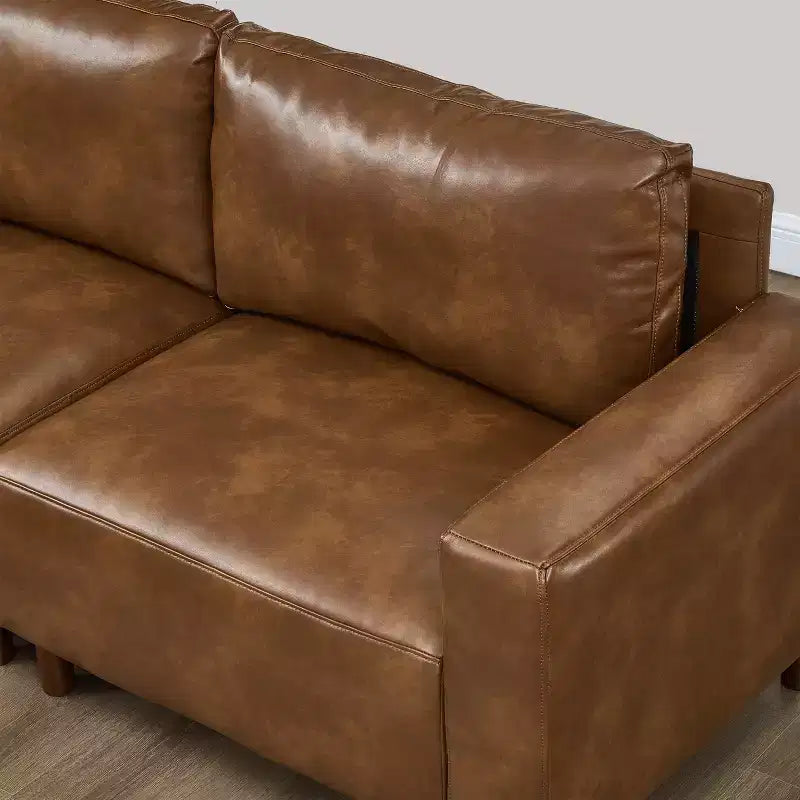Divano componibile a 3 posti GDFStudio Arvin 112 in finta pelle con pouf