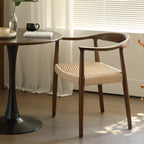 Sedia da pranzo scandinava in legno curvato con seduta intrecciata e braccioli