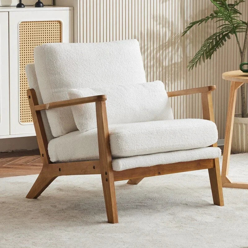 Poltrona d’accento imbottita in misto lino con gambe in legno e un cuscino, beige