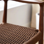 Sedia da pranzo scandinava in legno curvato con seduta intrecciata e braccioli
