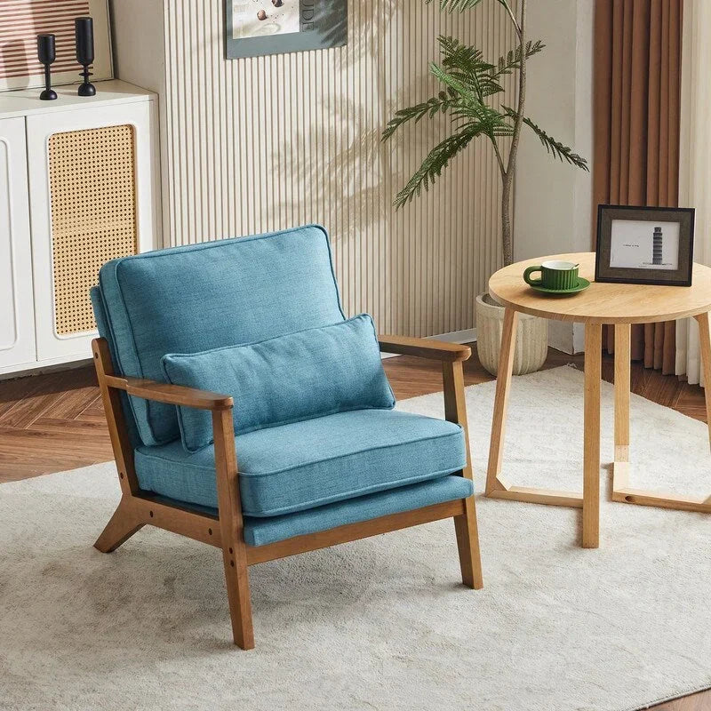 Poltrona d’accento imbottita in misto lino con gambe in legno e un cuscino, beige