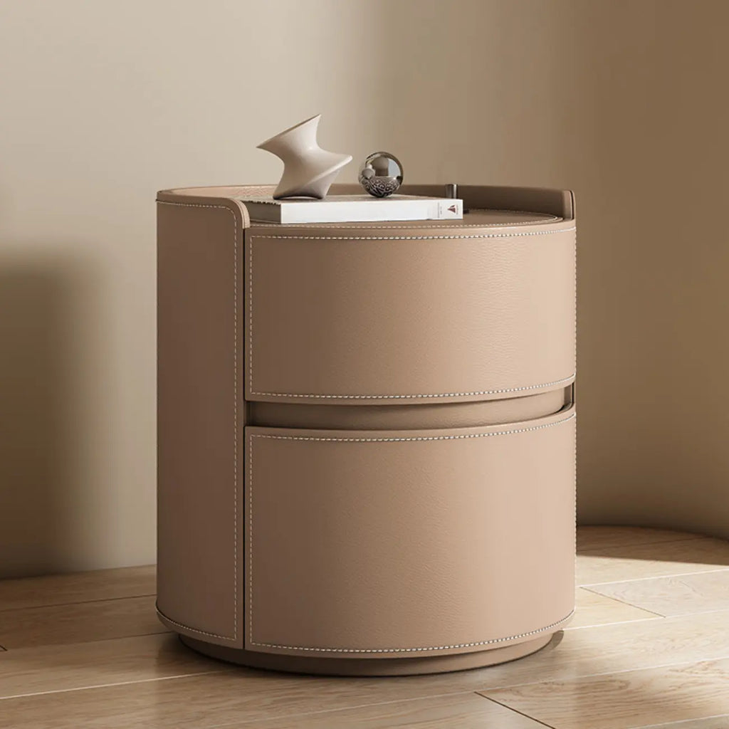 Moderne ronde nachtkast met leren blad en 2 laden