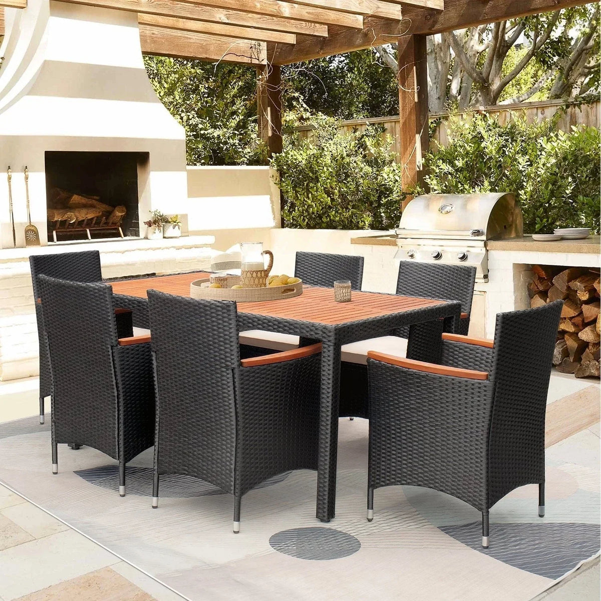 Set da pranzo da esterno Lacoo in vimini PE e legno di acacia