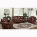 Set Brandon composto da divano e due poltrone in pelle italiana pieno fiore color whiskey dall'aspetto vissuto