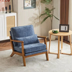 Poltrona d’accento imbottita in misto lino con gambe in legno e un cuscino, beige