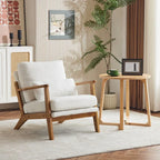 Poltrona d’accento imbottita in misto lino con gambe in legno e un cuscino, beige