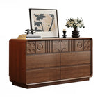 Commode en bois inspirée de l’Art déco avec motifs géométriques sculptés
