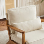 Poltrona d’accento imbottita in misto lino con gambe in legno e un cuscino, beige
