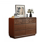 Commode en bois inspirée de l’Art déco avec motifs géométriques sculptés