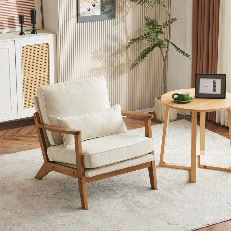 Poltrona d’accento imbottita in misto lino con gambe in legno e un cuscino, beige